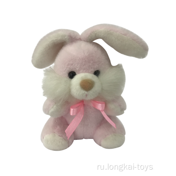 Розовый плюшевый кролик с лентой